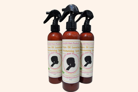 Three bottles of Argan Shine Revival Leave-In Mist bottle, 8oz with gold and cream label featuring argan for medium porosity shine enhancements 