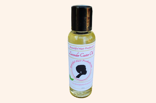 Lavender & Castor Scalp Therapy Oil bottle, 2oz with purple and cream label for therapeutic scalp treatment