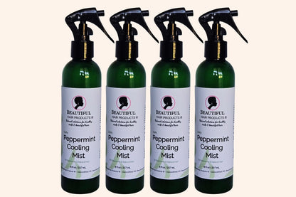 Four bottles of Peppermint Daily Cooling Mist 8oz bottle with green and cream label for Sisterlocks and natural hair moisturizing