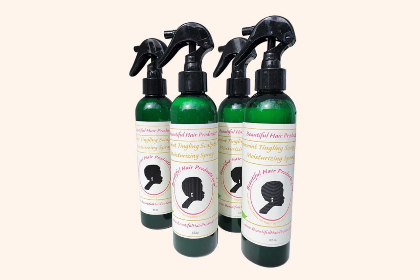 Four bottles of Peppermint Daily Cooling Mist 8oz bottle with green and cream label for Sisterlocks and natural hair moisturizing