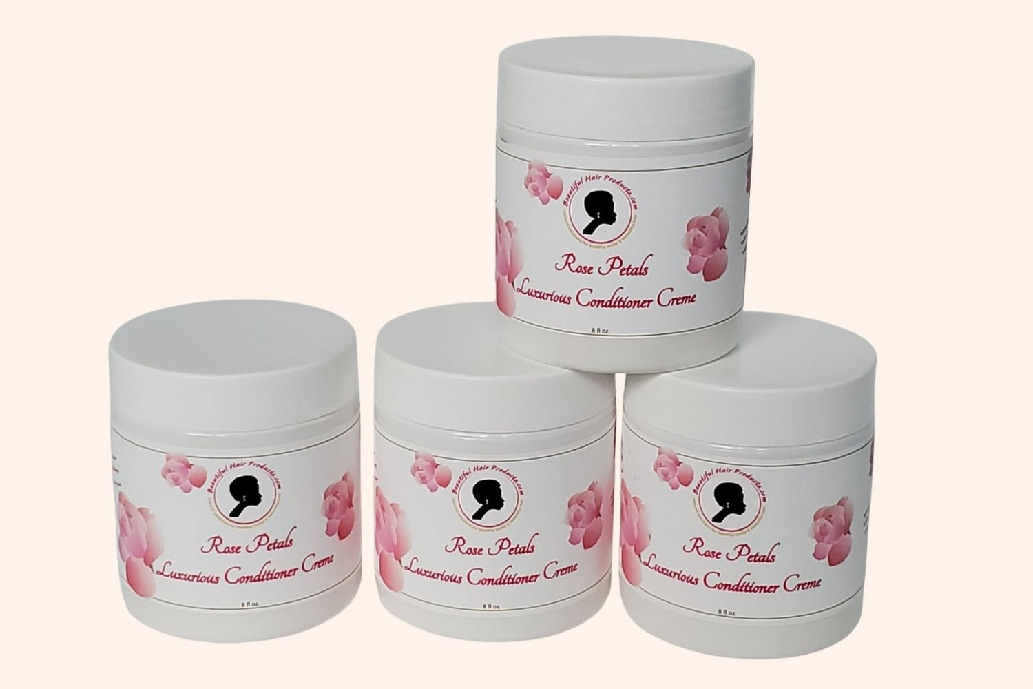 Four jars of Rose Petals Deep Conditioner 8oz jar with pink and cream label for intensive medium porosity hair treatment