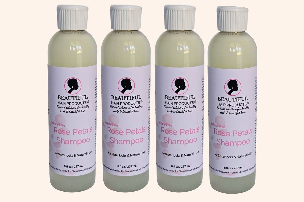 Four bottles of Rose Petals Sulfate-Free Shampoo for Sisterlocks and medium-porosity hair.