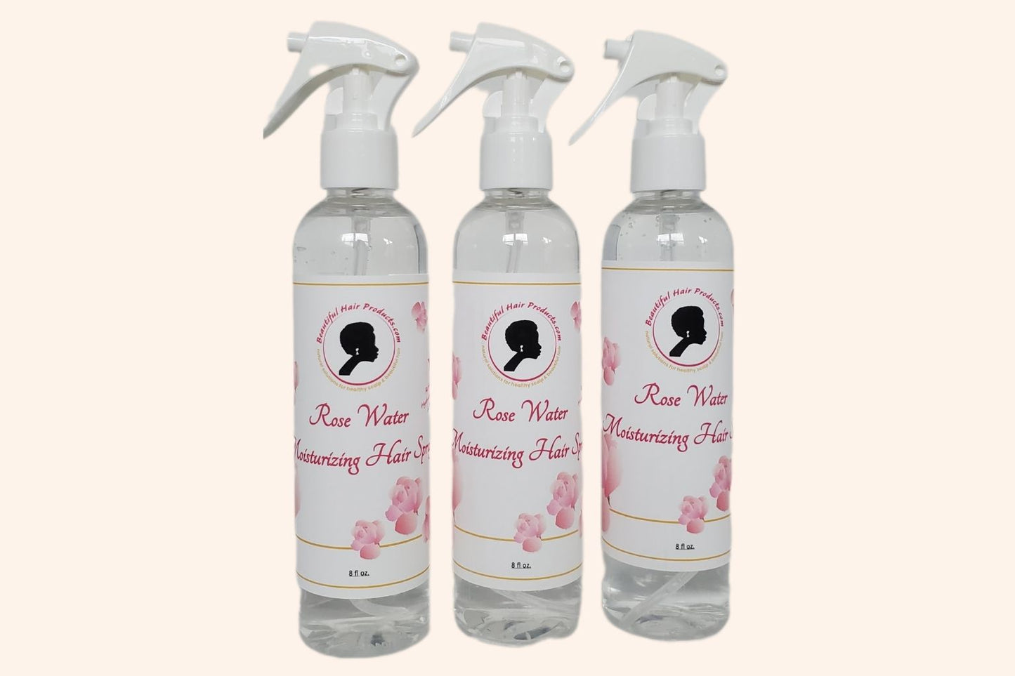 Three bottles of Rose Water Hydrating Spray 8oz bottle with pink and cream label for daily moisture mist for medium porosity hair